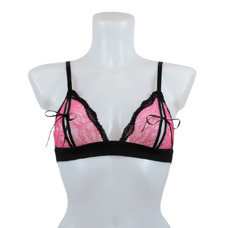 Das Bralette ouvert aus pinker Spitze mit schwarzen Einfassungen hat offene Cups, die spielerisch mit Schleifen geschlossen werden - fishbelly Lingerie handmade in Berlin