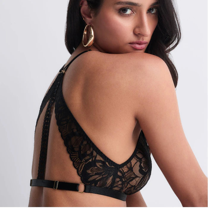 Schwarzes Bralette aus Spitze mit tiefem Ausschnitt aus der Serie "After Hours" von Aubade Paris, seitliche Ansicht