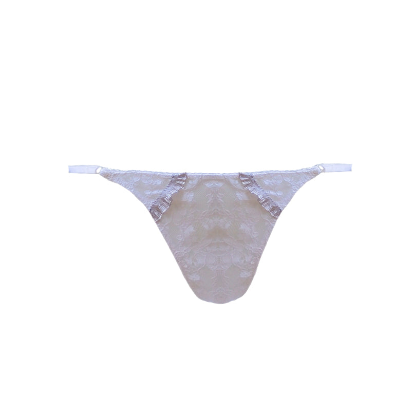 Weißer Tanga-String aus zarter, durchbrochener Spitze mit einem braun-weißen Rüschendetails verziert von fishbelly Lingerie - handmade in Berlin