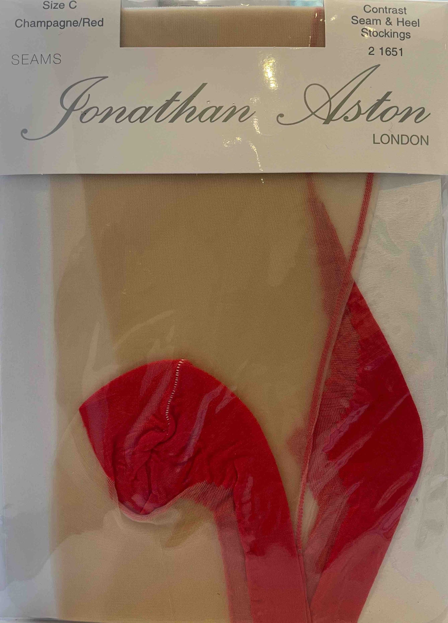 Champagne colored seamed stockings with red seam